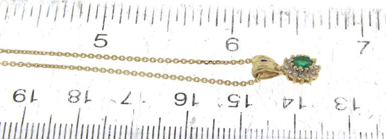Charming Yellow Gold Emerald and Diamond Necklace