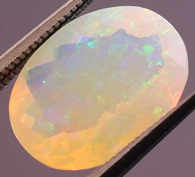 Captivating 2.61ct fairy fire semi black Opal