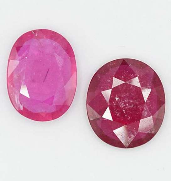 PAIR OF VIOLET RED NATURAL RUBY FACETED OVAL CUT