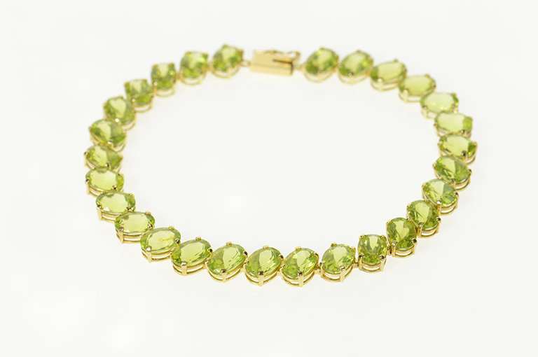 14K Yellow Gold Oval Peridot Classic Statement Tennis Bracelet