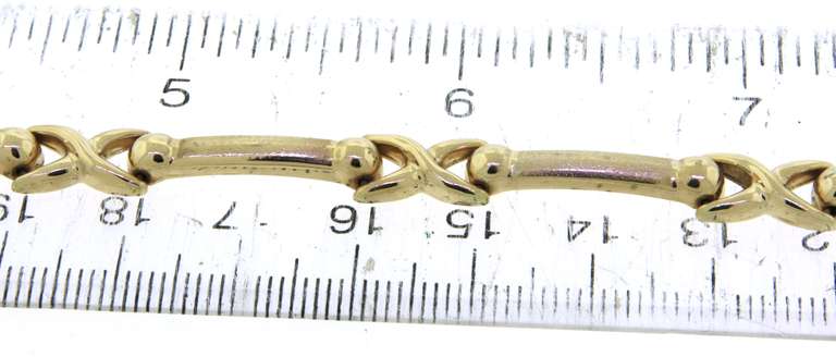 Powerful Yellow Gold Hug and Kisses Bracelet