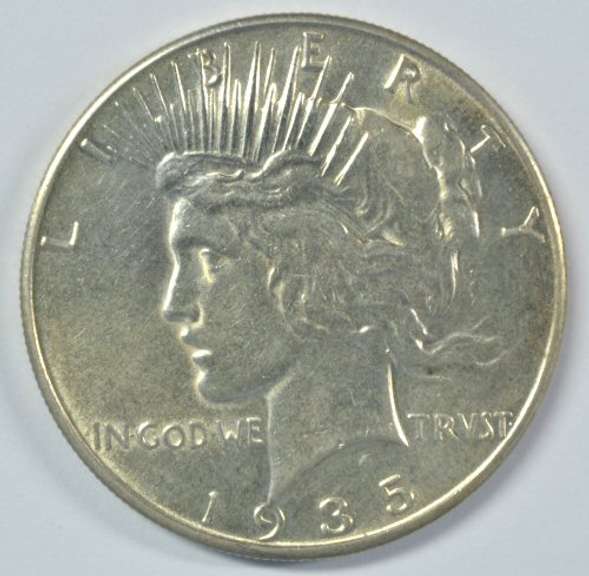 Fully struck 1935-P Peace Silver Dollar. Unc Details