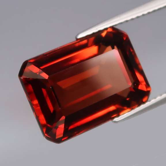 Top whiskey red 14.97ct emerald cut Imperial Topaz