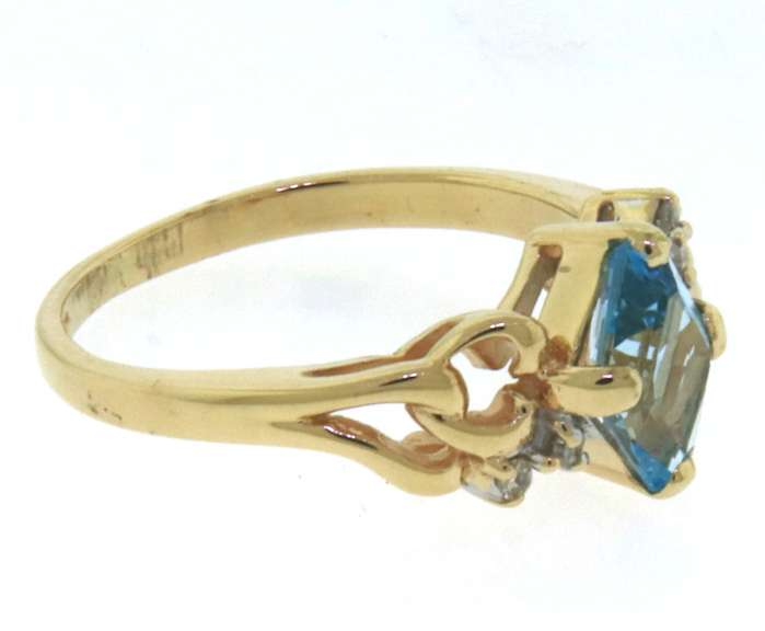 Fantastic Yellow Gold Topaz and Diamond Ring