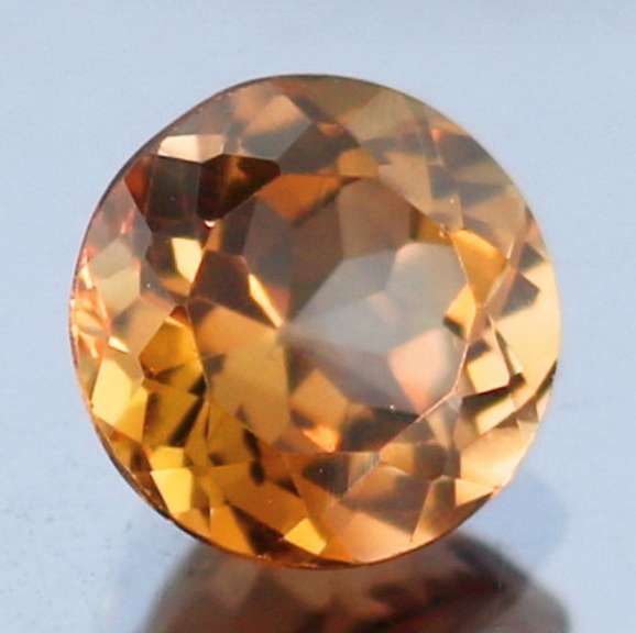 Rich red amber 3.56ct Imperial Topaz solitaire