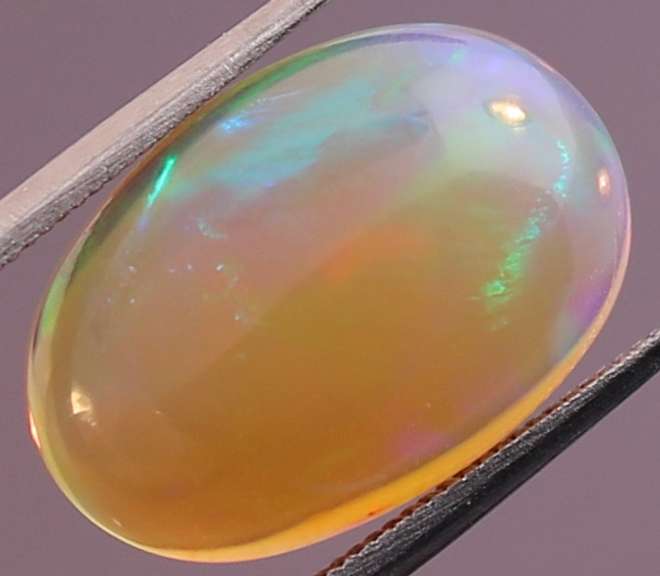 4.35ct block and ribbon pattern semi black Jelly Opal