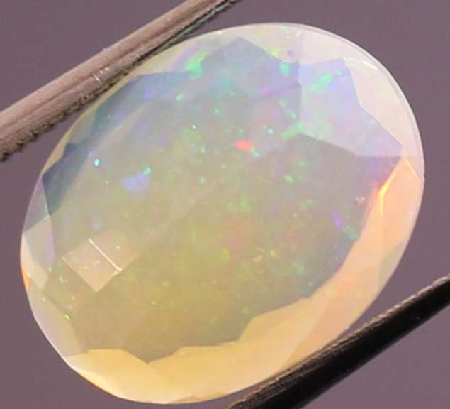 Captivating 2.61ct fairy fire semi black Opal