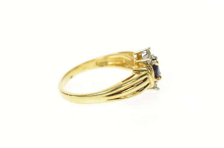 10K Yellow Gold Oval Sapphire Baguette Diamond Halo Ring