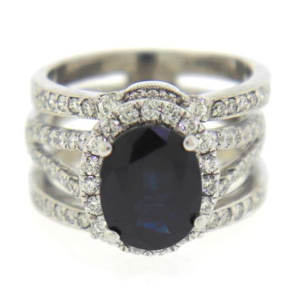 Breathtaking 18kt Blue Sapphire and Diamond Halo Ring