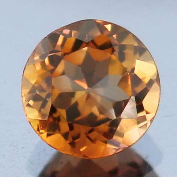 Rich red amber 3.56ct Imperial Topaz solitaire