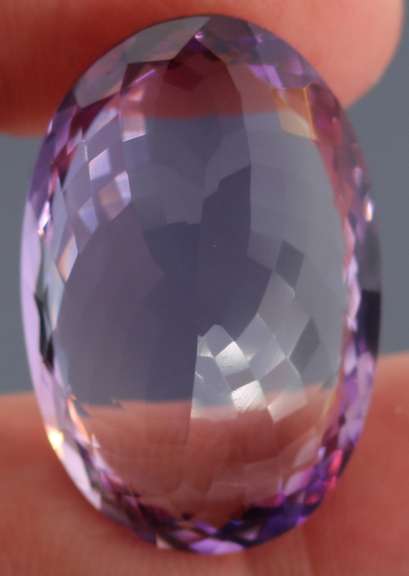 Halo flashing 40.5ct real unheated Bolivian Amethyst
