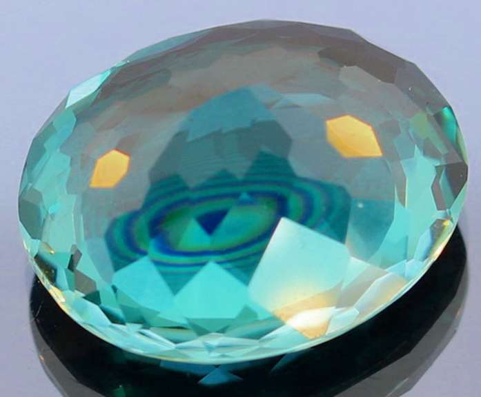 26.73ct top blue green hue created Amethyst