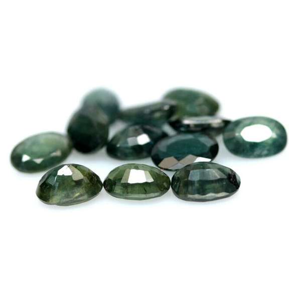 Heated only! 7.10ct blue green Sapphire set