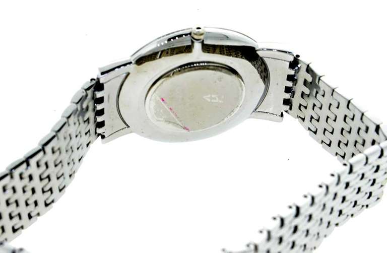 HELBROS MENS SILVERTONE BRACELET WATCH WITH BLACK DIAL .