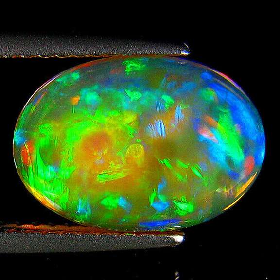 Floral flashing 3.04ct untreated semi-black Welo Opal