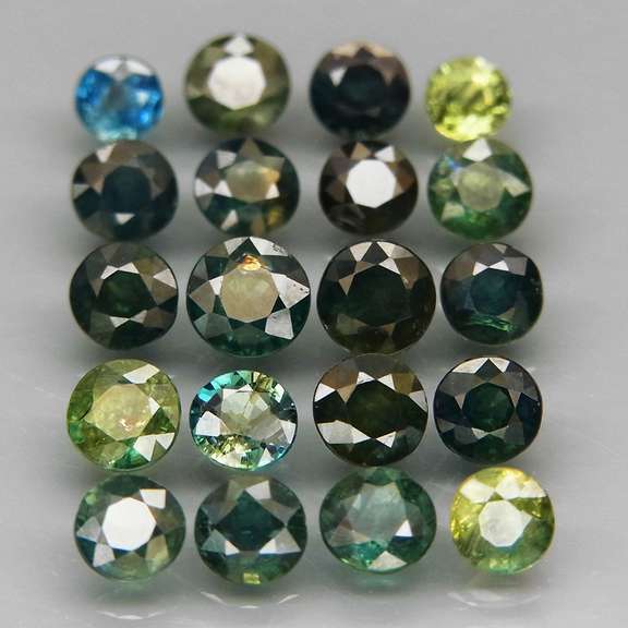 Heated only! 6.79ct round cut Sapphire set