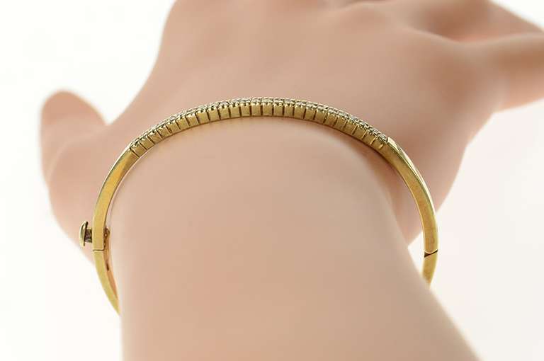 10K Yellow Gold 0.62 Ctw Diamond Channel Oval Bangle Bracelet