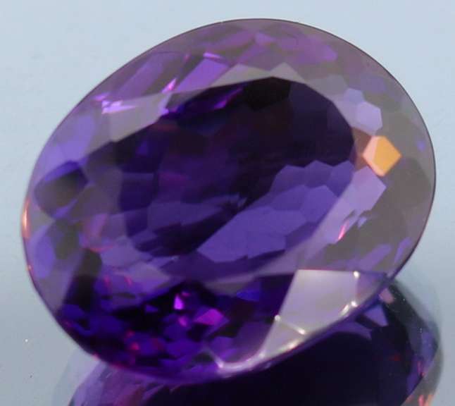 Oval cut 29.04ct deep purple created Amethyst