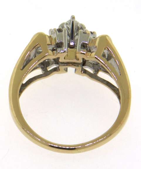 Dazzling Yellow Gold Marquise Baggeutte Engagement Ring