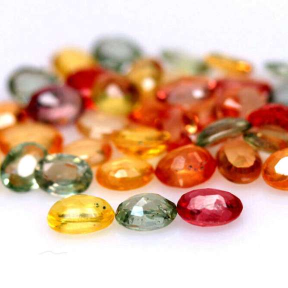 Heated only! 6.99ct fancy color Sapphire set