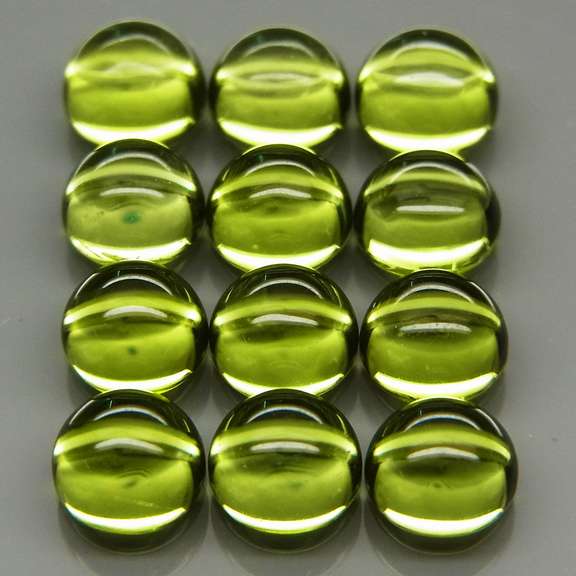 Gorgeous 8.02ct 12pc lime green Peridot set