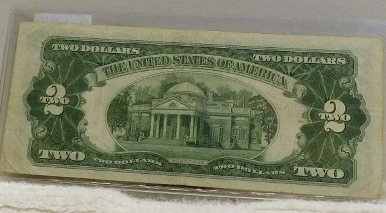 1928-G $2.00 FRN Red Seal, first yr , near CU