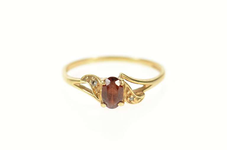 10K Yellow Gold Retro Oval Syn. Garnet CZ Accent Wavy Ring