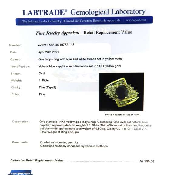 Wonderful Yellow Gold Oval Sapphire and Diamond Baguette Ring