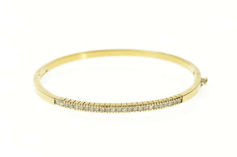 10K Yellow Gold 0.62 Ctw Diamond Channel Oval Bangle Bracelet