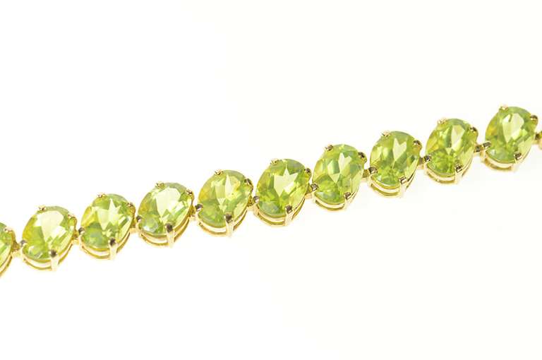 14K Yellow Gold Oval Peridot Classic Statement Tennis Bracelet