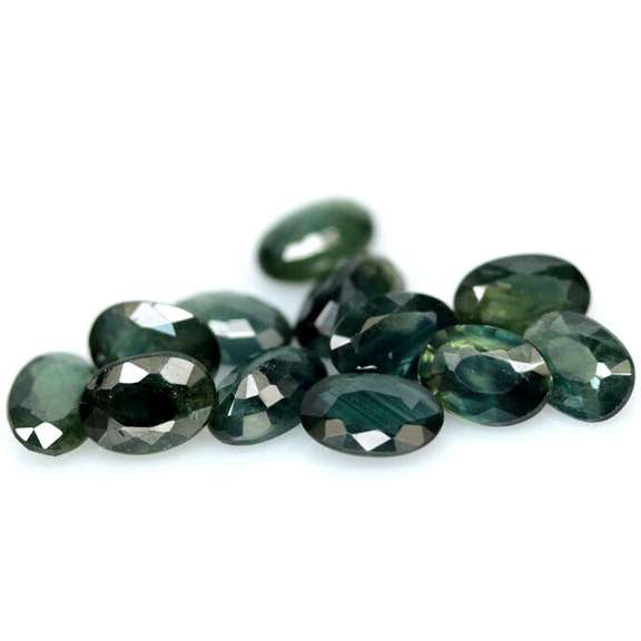 Heated only! 7.10ct blue green Sapphire set