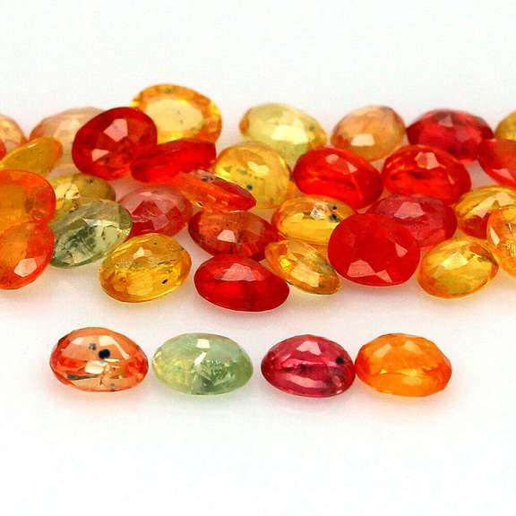 9.46ct heated only Autumn leaves Sapphire set