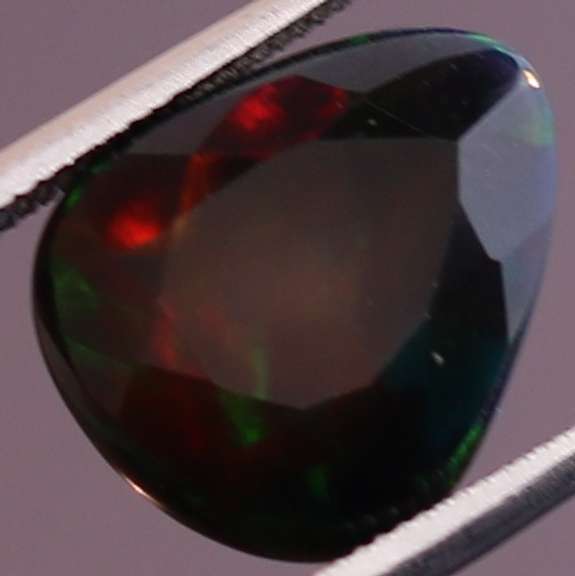 Rainbow flashing 2.84ct Black Opal