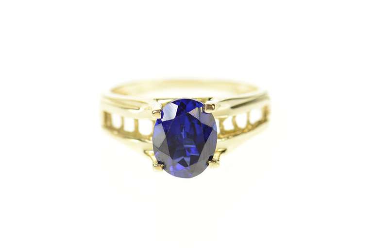 14K Yellow Gold Syn. Oval Sapphire Raised Statement Ring