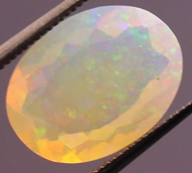 Captivating 2.61ct fairy fire semi black Opal