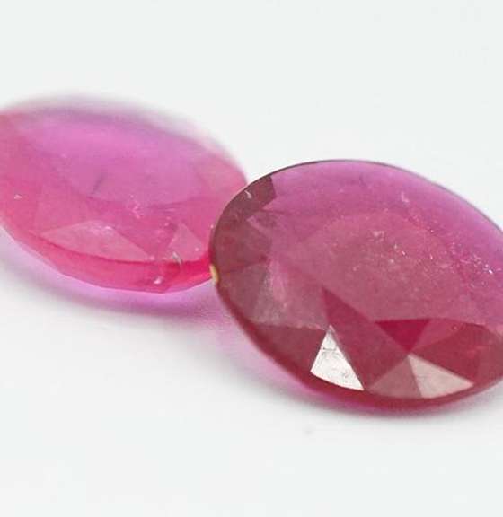 PAIR OF VIOLET RED NATURAL RUBY FACETED OVAL CUT