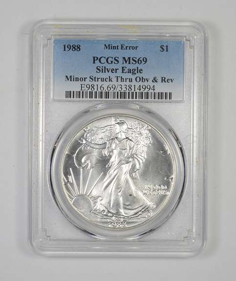 MS69 1988 American Silver Eagle Error Minor Struck Thru OBV & REV PCGS