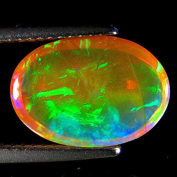 Floral flashing 3.04ct untreated semi-black Welo Opal