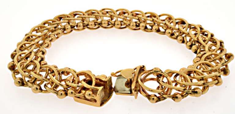 Charming 14kt Yellow Gold Interlocking Multi-Link Bracelet
