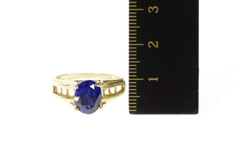 14K Yellow Gold Syn. Oval Sapphire Raised Statement Ring