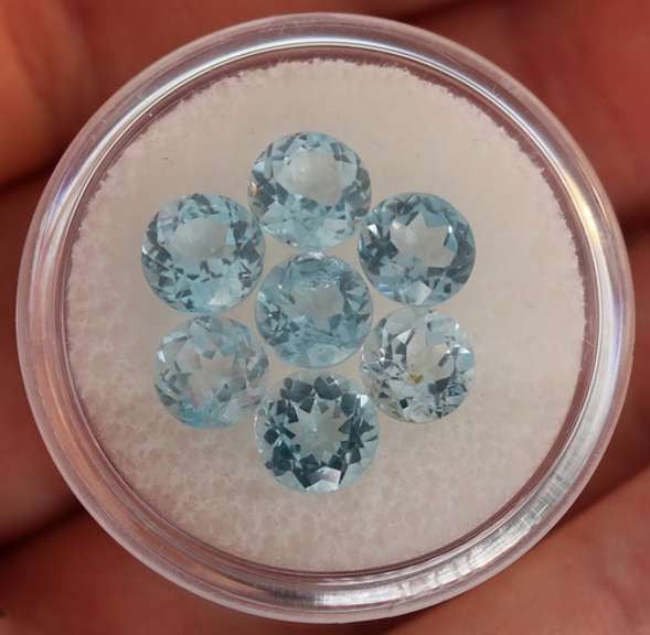 Superb quality 7.93ct 7 pc sky blue Topaz solitaire set