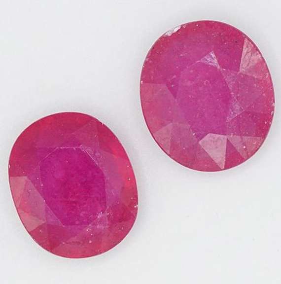 PAIR OF VIOLET RED NATURAL RUBY OVAL CUT