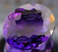 Oval cut 30.58ct royal purple created Amethyst
