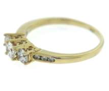 Glamorous Yellow Gold Past, Present and Future Diamond Ring
