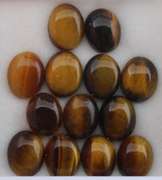Untreated 31.28ct full cats eye Tigers Eye set