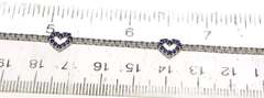 Powerful 18kt Diamond and Blue Sapphire Tennis Bracelet