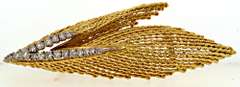 Unique 18kt yellow gold brooch with diamonds