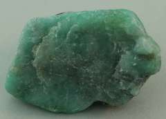 Verdant 26.20ct raw Emerald in matrix