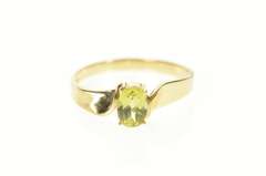 10K Yellow Gold Oval Peridot Solitaire Curved Design Simple Ring
