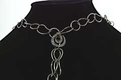 Highlight :  Hand made 18kt White Gold Necklace with Diamond Swirl Pendants